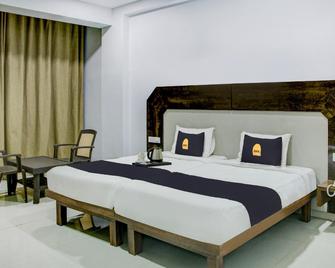 Townhouse Oak Hotel Vihar Deluxe - Ratnagiri - Спальня