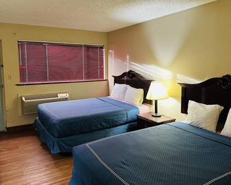 Warrick Plaza Inn - Plainview - Bedroom