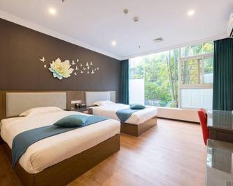Huiyin Fashion Hotel - Guangzhou - Bedroom