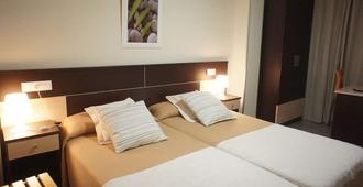 Hotel MR - Tarragona - Schlafzimmer