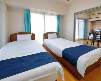 Hotel Nishikawaguchi Weekly - Kawaguchi - Sypialnia