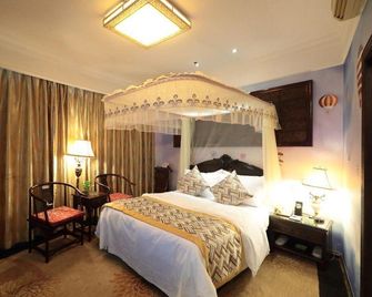 Jindu Crown Hotel - נאנצ'אנג - חדר שינה