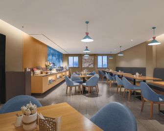 Home Inn Neo Qingdao North Railway Station Chongqing Middle Road - Qingdao - Restaurante