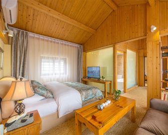 C'est La Vie Boutique Inn - Lijiang - Schlafzimmer