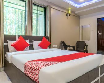 Collection O Orchid Platinum Guest House - Pimpri - Chinchwad - Bedroom