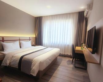 Jia Tai Chain Business Hotel Chaoyang Chaochong - Chaoyang - Slaapkamer