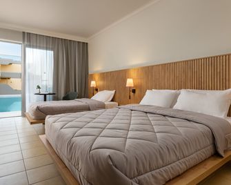 Kresten Palace Hotel - Koskinou - Schlafzimmer