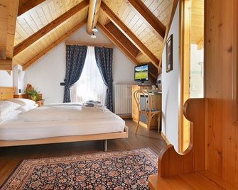 Hotel Livigno - ליביניו - חדר שינה
