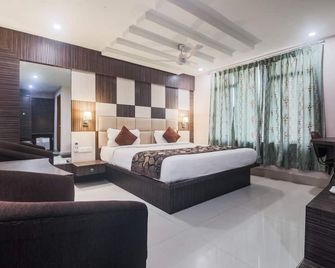 Hotel Royal Heritage - גוואטי - חדר שינה