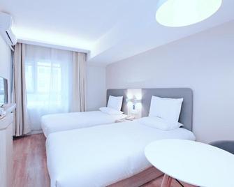 Hanting Hotel Nanjing Xinjiekou Metro Station - Nanjing - Bedroom