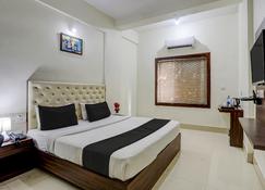 Collection O Triple Tree Hotels & Resorts - Bhubaneśwar - Sypialnia