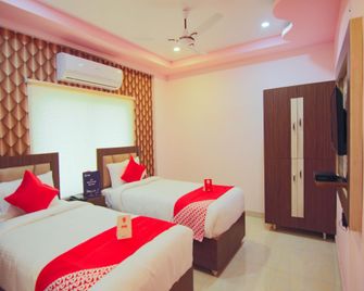 Hotel O B Square - Visakhapatnam - Bedroom