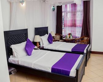 New Hotel Aquiline - Arusha - Slaapkamer