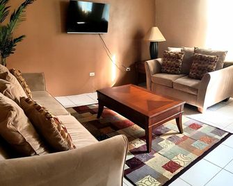 5 minutes from Capital and FREE parking, 2 - Bdrm 2Bth - Road Town - Living room