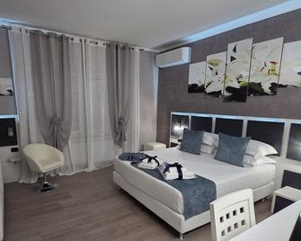 Albis Rooms Guest House - Fiumicino - Camera da letto
