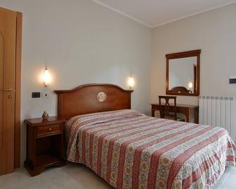 Albergo Villa Bianca - סן ג'ובאני רוטונדו - חדר שינה