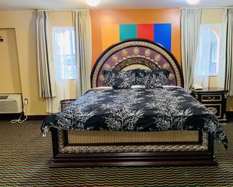 Motor City Inn & Suites - Melvindale - Slaapkamer