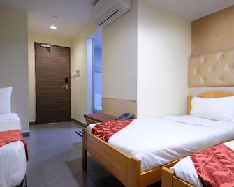Sandpiper Hotel - Singapur - Yatak Odası