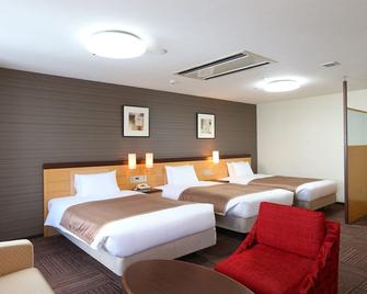 Hotel Hokke Club Sapporo - סאפורו - חדר שינה