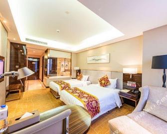 Siji Xin Bao Lai Hotel - Wuhan - Habitación