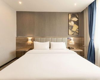 7 Days Premium Hotel (Jinan Daming Lake) - Jinan - Habitación