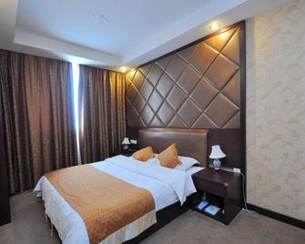 Mingdu Junyue Business Hotel - Bengbu - Bedroom