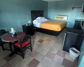 بادجيت موتل - أورلاندو - غرفة نوم