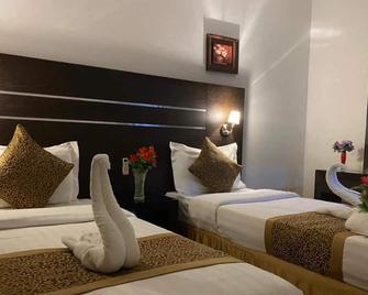 Rest Night Hotel Suites- - Al Nafal - Riad - Habitación