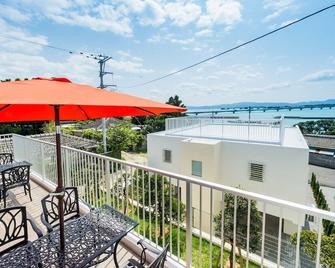 Kouri Fourseason Resort - Nakijin - Balkong