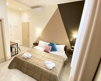 B&B De Nava Suite - Reggio Calabria - Schlafzimmer