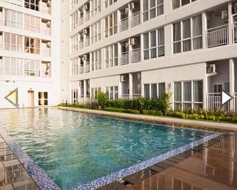 Apartemen Taman Melati Margonda by Winroom - Depok - Bazén
