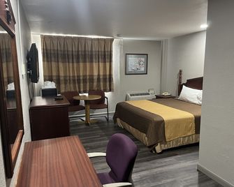 Mid Towne Inn and Suites - סן אנטוניו - חדר שינה