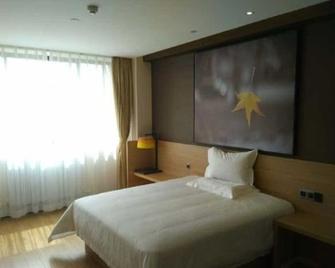 Xi'an Holiday Hotel - Xi'an - Bedroom