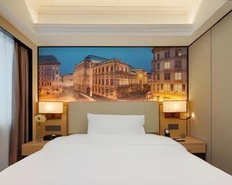 Vienna International Hotel Guangzhou Railway Station Sanyuanli Metro Station - Guangzhou - Bedroom