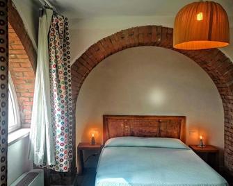 Giganti Verdi - Appartamento Kiwi - Orbetello - Chambre