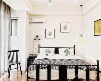 Shanyue Seaview Apartment (Dalian Wanda Plaza Branch) - Dalian - Camera da letto