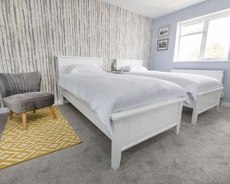 The Sleep-Inn Hare B&B - הרן ביי - חדר שינה