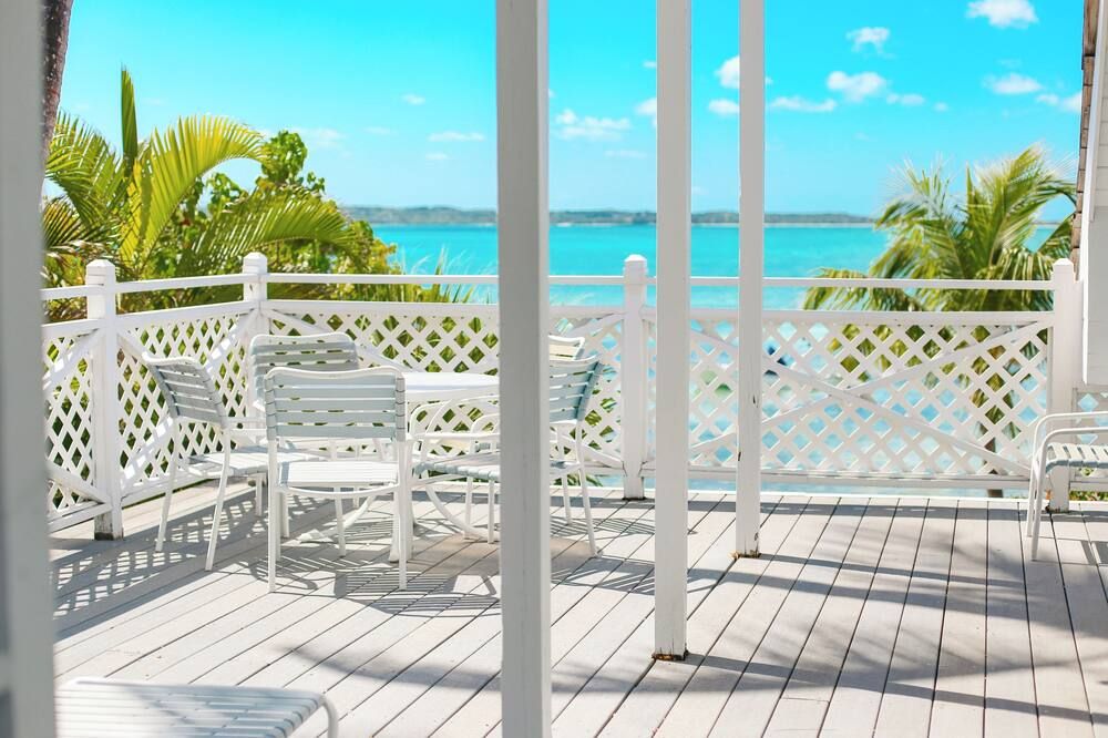 Blue Dolphin - Waterfront, 4 Sunset Decks, Dock, 5+ Bedrooms, Enclosed Garden - Dunmore Town - شرفة