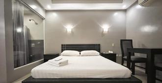 Rumi Apartelle Hotel - אנג'לס סיטי - חדר שינה