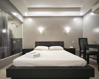 Rumi Apartelle Hotel - אנג'לס סיטי - חדר שינה