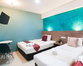 Dj Citi Point Hotel - קואלה טרנגאנו - חדר שינה