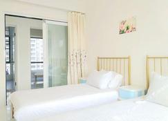 Guanlan New Town Holiday Apartment (Haikou Guanlanhu New Town Upper East) - Haikou - Bedroom