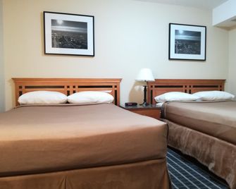 Medicine Hat Inn & Suites - Medicine Hat - Schlafzimmer