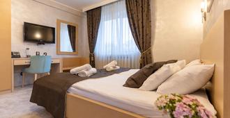 Euro Garni Hotel - Belgrado - Camera da letto