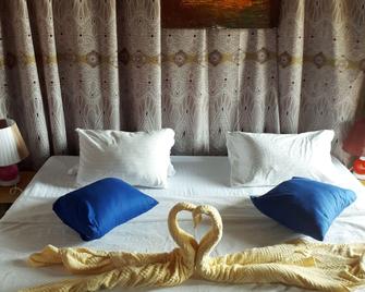 Yala Waves Beach Resort - Kirinda - Schlafzimmer