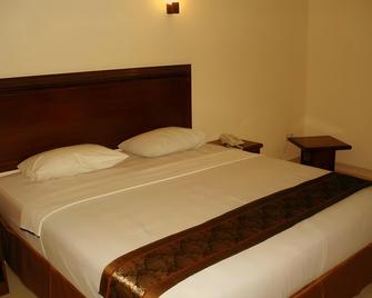 Basana Inn - Biak - Habitación