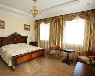 Hotel Manor House - Tsjeboksary - Slaapkamer