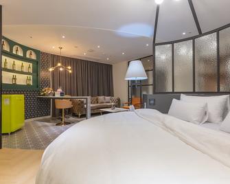 김해 노마드 호텔 - 김해 - 침실