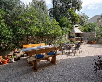 Apartments by the sea Mandre, Pag - 4092 - Kolan - Patio