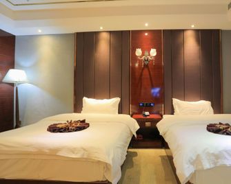 Beitun Xiangyi Haichuan International Hotel - Beitun - Habitación
